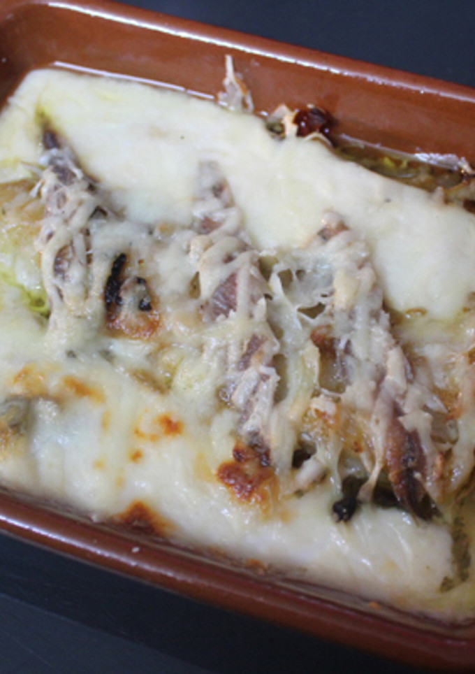 Una foto de Bacalao en bechamel con anchoas