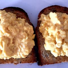 A picture of Scrambled eggs on toast.