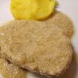 Pork in a creamy artichoke sauce with saffron mash
