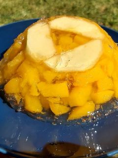 Una foto de Gelatina de melocotón con trocitos