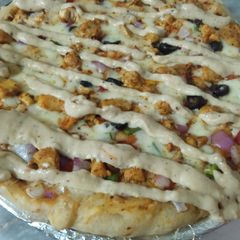 A picture of Cheese sauce creamy chicken 🍕🍕.