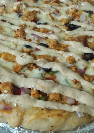 A picture of Cheese sauce creamy chicken 🍕🍕.