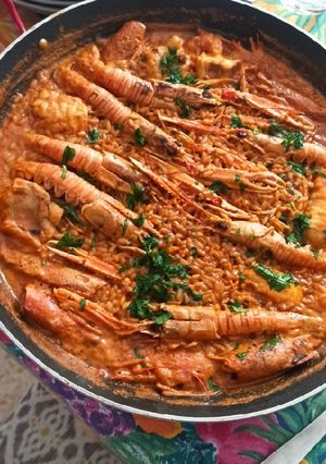 Una foto de Arroz meloso de rape y cigalas