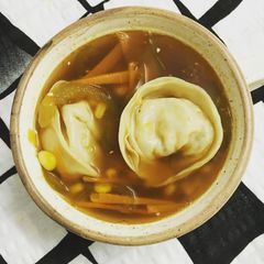 A picture of Clear Soup with Dumplings.
