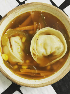A picture of Clear Soup with Dumplings.