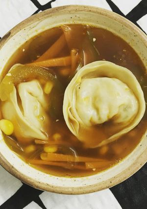A picture of Clear Soup with Dumplings.