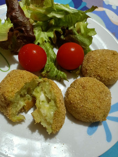 Foto di Polpette di broccolo filanti
