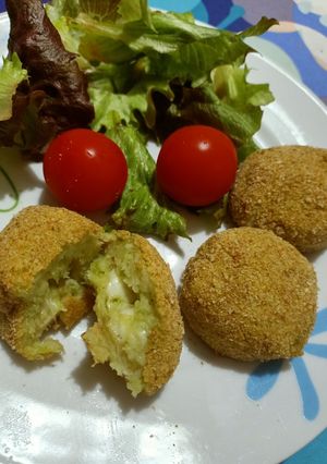 Foto di Polpette di broccolo filanti
