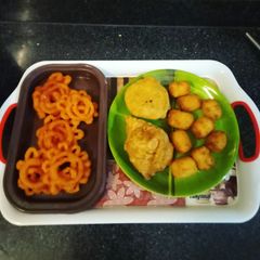 A picture of Potato cheese bite samosa and kachori aloo matar.