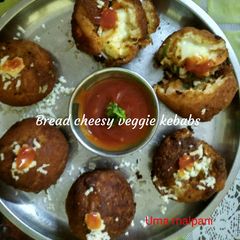 A picture of Bread cheesy veggie kebabs.