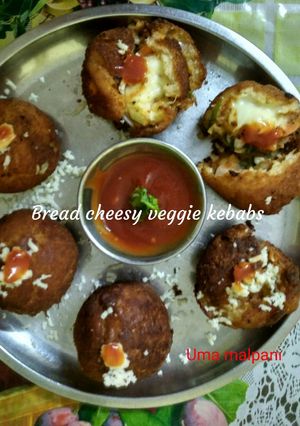 A picture of Bread cheesy veggie kebabs.