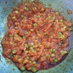 A picture of Tomato peas sabji.