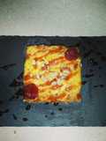 Quesada pasiega con salsa de frambuesa, miel y nueces