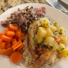 A picture of Grilled Chicken with Pineapple Jalapeño Salsa.