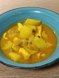 Wok de sepia con patatas y guisantes