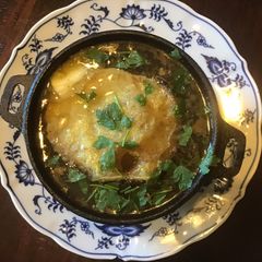 A picture of California Farm Baked Yellow Onion Soup.