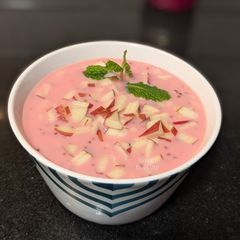 A picture of Rooh Afza custard with chia seeds.