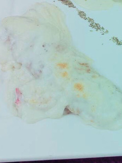 Una foto de Canelones de acelga, ricota y nuez con salsa blanca