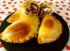 Foto principal de Empanadillas caseras de cebolla caramelizada y queso de rulo