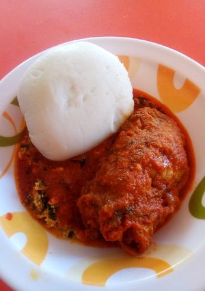 A picture of Egusi+stew and pounded yam.