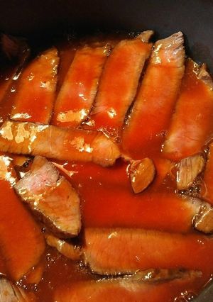 A picture of Buttery London Broil with Slobber Knocker sauce.