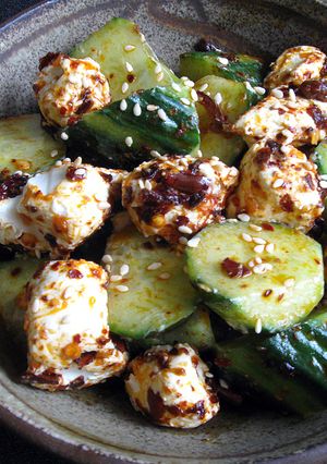 A picture of Cucumber & Cream Cheese with Crispy Chilli Oil.