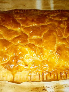 Una foto de Hojaldre relleno de espinacas y beicon