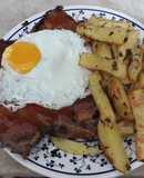 Bife angosto a la barbacoa con papas aromáticas
