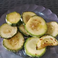 A picture of Sautéed zucchini with butter and garlic.