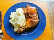 Una foto de muslo pollo de campo