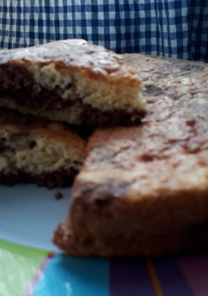 Una foto de Torta marmolada económica 😋