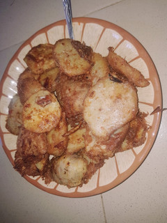 A picture of Fried Coco yam in egg.