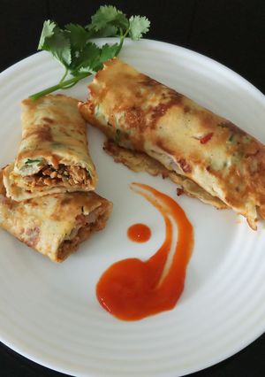A picture of Egg Pancake with chicken keema.