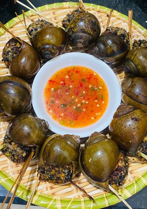 Hình của món Ốc nhồi thịt nướng sả.
