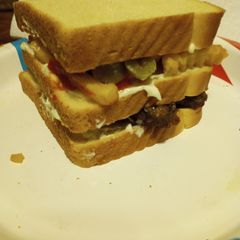 A picture of Jalapeno Burger with Fries Sandwich.