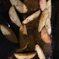 A picture of Spicy Potato wedges.
