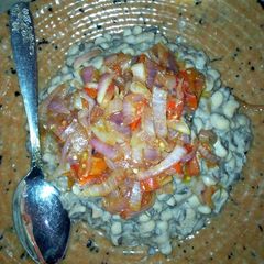 A picture of Beans and simple sauce.