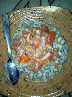 A picture of Beans and simple sauce.
