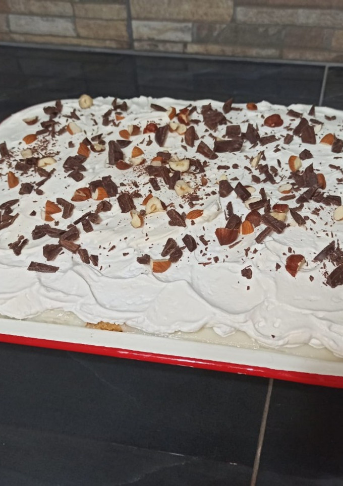 Una foto de Postre ‘’borrachito’’ de tres sabores con vainillas CASERO