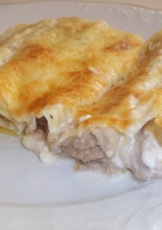 Una foto de Canelones de carne picada de cerdo y de ternera
