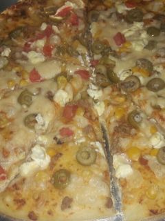 صورة لوصفة عجينة بيتزا طريه كثير