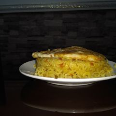 A picture of Noodles and omelette.