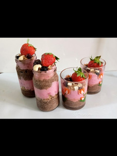A picture of Chocolate chia seed parfait with strawberry yogurt.