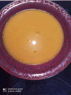 Una foto de Crema de calabaza y zanahoria