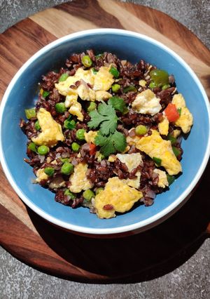 A picture of EGG FRIED RICE with BLACK RICE.