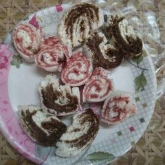A picture of Jam and chocolate bread swiss roll.