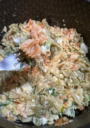 Una foto de Moñitas con salsa bechamel de perejil y huevo