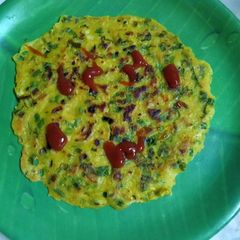 A picture of Mix flour spring onion cheela.