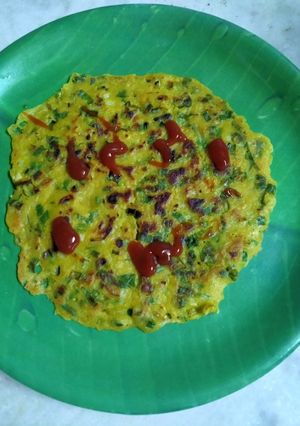 A picture of Mix flour spring onion cheela.