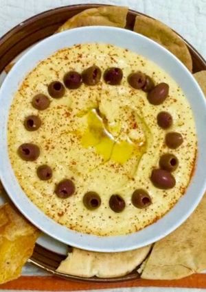 Una foto de Hummus y Pita Tostadas
